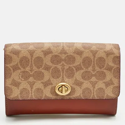 Coach Brown/beige Signature Coated Canvas And Leather Marlow Clutch Bag