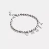 Coach Butterfly And Rexy Charm Pearl Bracelet In Gray