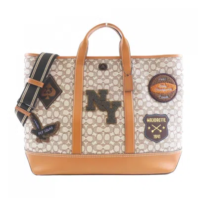 Pre-owned Coach Canvas Leather Handbag () In Brown