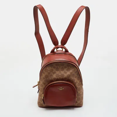 Pre-owned Coach Carrie 23 Brown Signature Coated Canvas And Leather Backpack In Beige