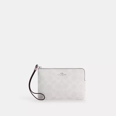 Coach Corner Zip Wristlet In Signature Canvas