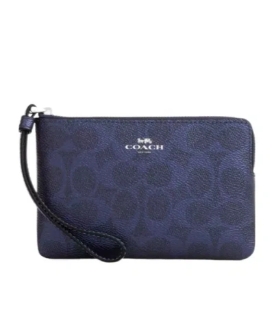 Coach Corner Zip Wristlet In Signature Canvas In Blue