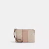 Coach Corner Zip Wristlet In Signature Canvas With Stripe In Beige