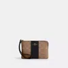 Coach Corner Zip Wristlet In Signature Canvas With Stripe In Beige