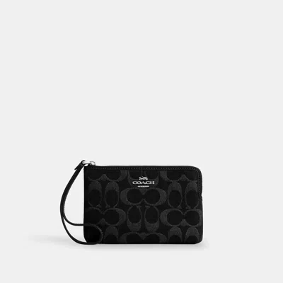 Coach Corner Zip Wristlet In Signature Denim In Black