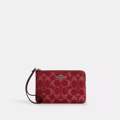 Coach Corner Zip Wristlet In Signature Denim In Red