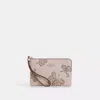 Coach Corner Zip Wristlet With Sparkly Butterfly Print In Pink