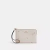 Coach Corner Zip Wristlet With Star Print In White