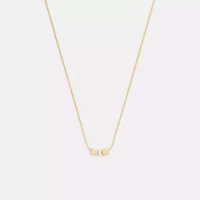 Coach Cube Pearl Rondelle Pendant Necklace In Gold