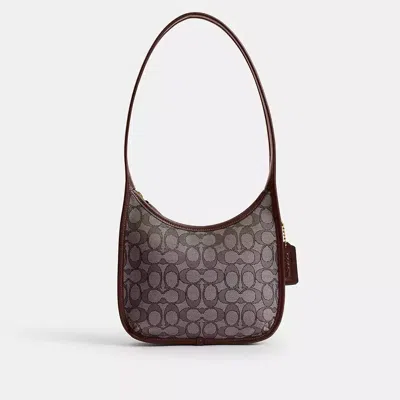 COACH CURVE ZIP BAG IN SIGNATURE JACQUARD