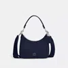 Coach In Deep Blue