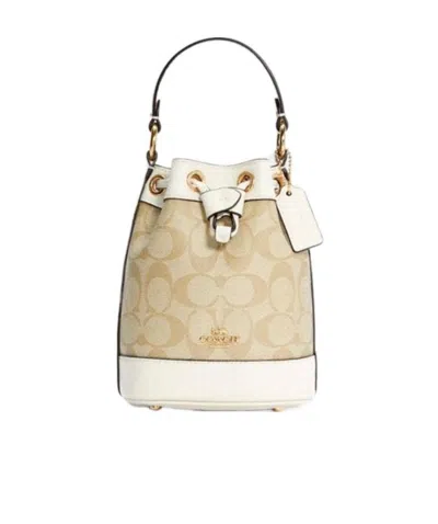 Coach Dempsey Series Shoulder Bags In Nude