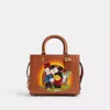 Coach Disney X  Rogue Bag 25 With Mickey Mouse And Minnie Mouse In Brass/burnished Amber Multi