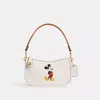 Coach Disney X  Swinger Bag In Regenerative Leather With Mickey Mouse In Brass/chalk Multi