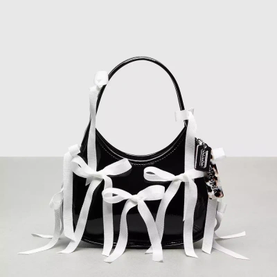 Coach Ergo Bag In Crinkle Patent Topia Leather With Bows All Over In Black