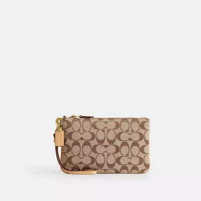 Coach Essential Small Wristlet In Signature Jacquard In Brown