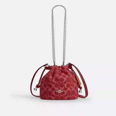 Coach Faye Mini Drawstring Bag In Signature Denim In Red