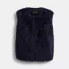 Coach Fluffy Shearling Vest In Blue