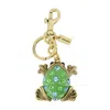 Coach Frog Crystal-embellished Bag Charm In Gold