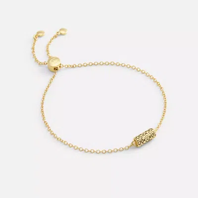 Coach In Gold