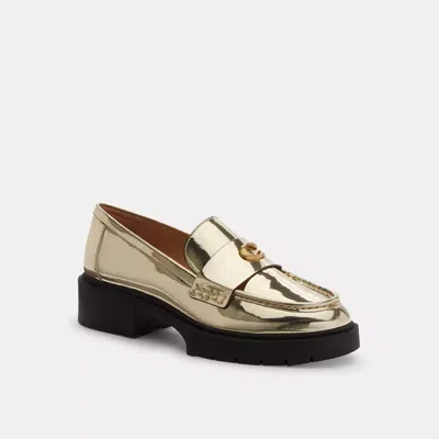 Coach In Gold