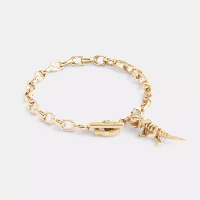 Coach In Gold