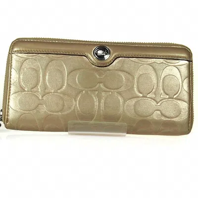Pre-owned Coach Gold Long Wallet (bi-fold) ()