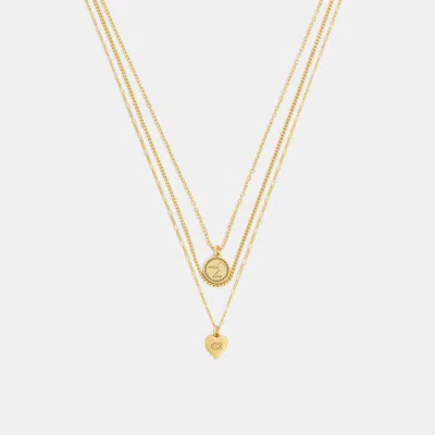 Coach Heart And Coin Layered Necklace In Gold