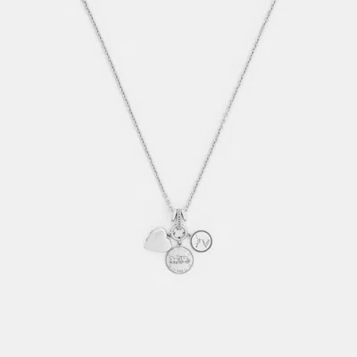 Coach Heart And Coins Cluster Pendant Necklace In Silver