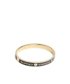 Shop Coach Heart And Star Enamel Bangle In Yellow