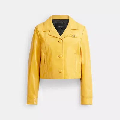 Coach Heritage C Patent Leather Jacket In Yellow