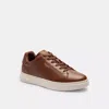 Coach High Line Sneaker In Dark Saddle