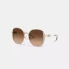 Coach Horse And Carriage Metal Round Sunglasses In Brown