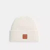 Coach Knit Beanie With Leather Patch In Chalk