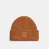 Coach Knit Beanie With Rubber Patch In Brown