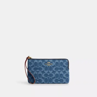 Coach Large Corner Zip Wristlet In Signature Denim In Blue