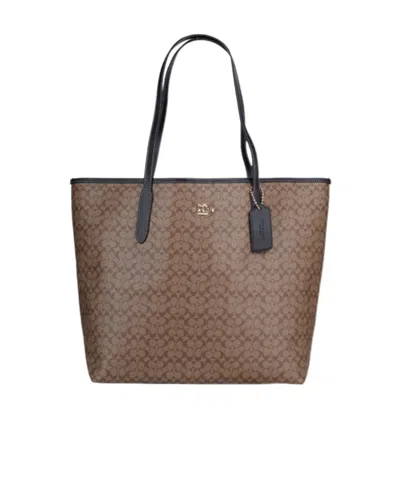 Coach Large Logo Letter Handbag In Brown