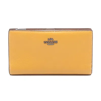 Coach Leather Slim Zip Wallet In Yellow
