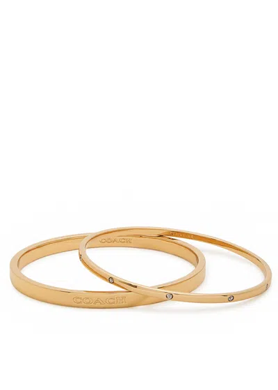 Coach Logo Bangle In Gold