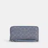 Coach Long Zip Around Wallet In Signature Canvas In Blue