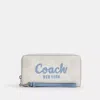 Coach Long Zip Around Wallet In Signature Canvas With Graphic In White