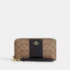 Coach Long Zip Around Wallet In Signature Canvas With Stripe In Beige