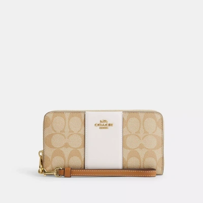 Coach Long Zip Around Wallet In Signature Canvas With Stripe In Brn