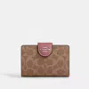 Coach Medium Corner Zip Wallet In Signature Canvas In Multi