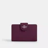 Coach Medium Corner Zip Wallet In Purple