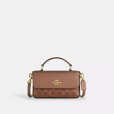 Coach Mini Josie Top Handle Bag In Signature Canvas In Brown