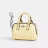 Coach Mini Rowan Bag Charm In Signature Canvas In Yellow