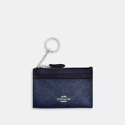 Coach Mini Skinny Id Case In Signature Canvas In Blue
