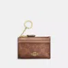 Coach Mini Skinny Id Case In Signature Canvas In Brown