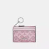 Coach Mini Skinny Id Case In Signature Canvas In Pink